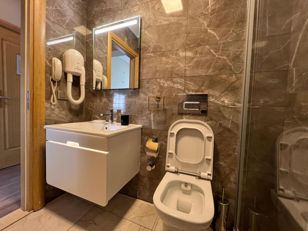 Deluxe Oda,Kısmi Deniz Manzaralı,Balkonlu