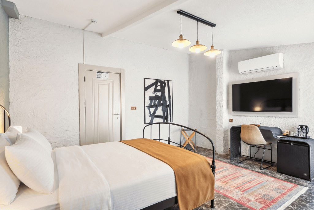 Deluxe Üç Kişilik Oda ,Şehir Manzaralı,2. Kat