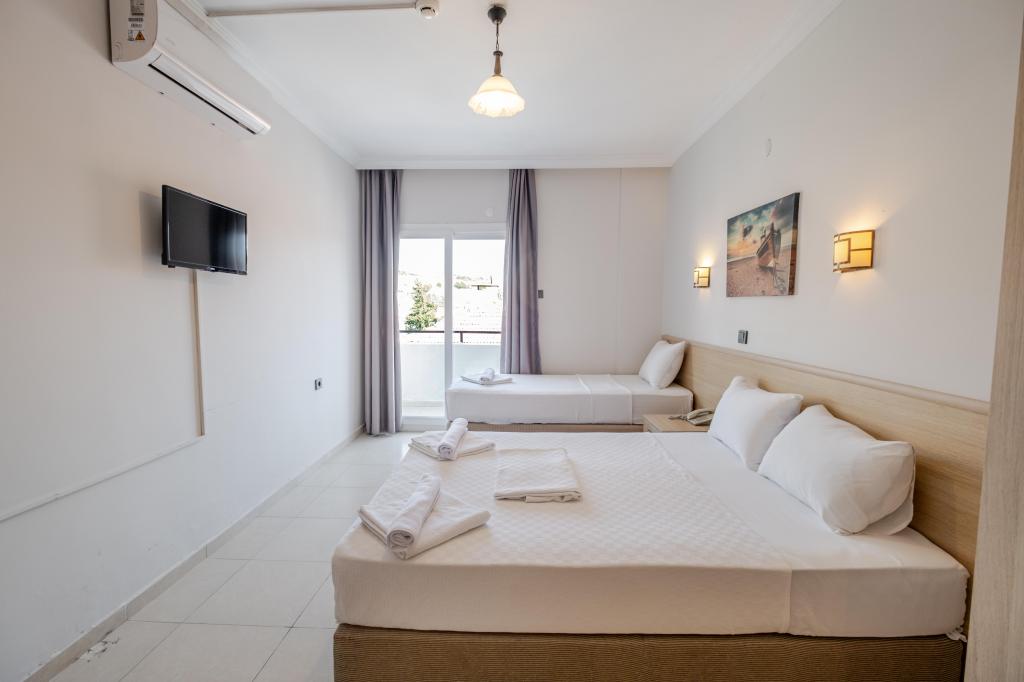 Standart Üç Kişilik Oda,Bahçe Manzaralı