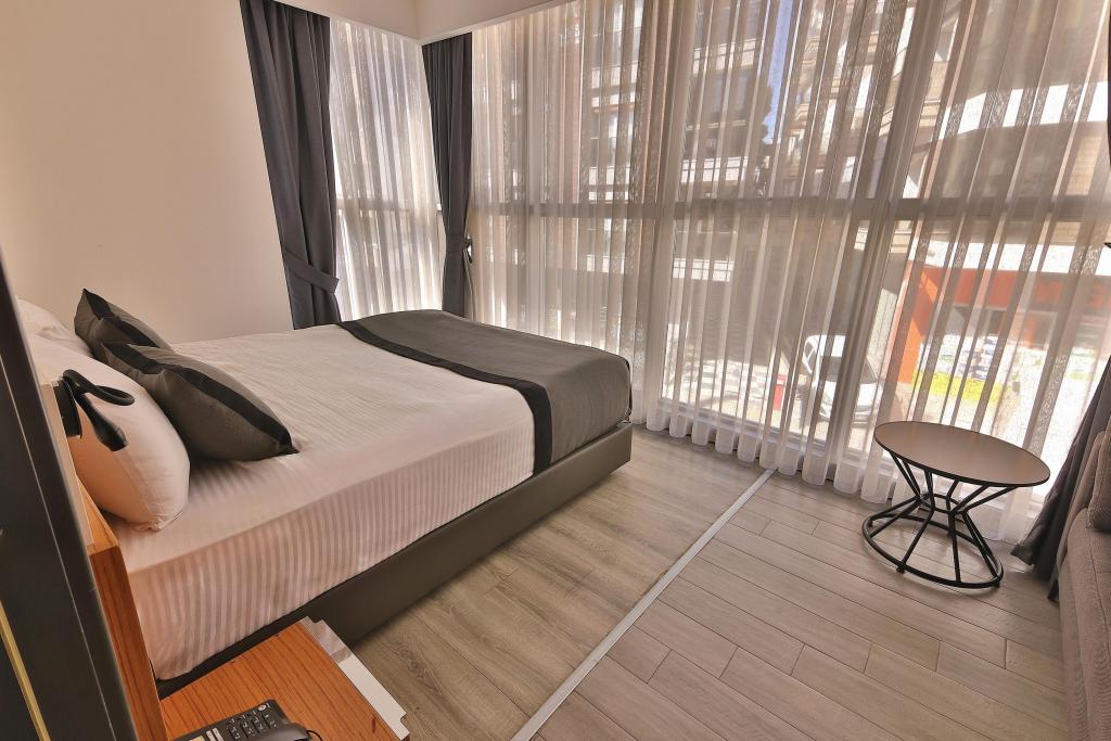 Suit Oda, Bahçe Manzaralı (3 Kişilik, Balkonlu)