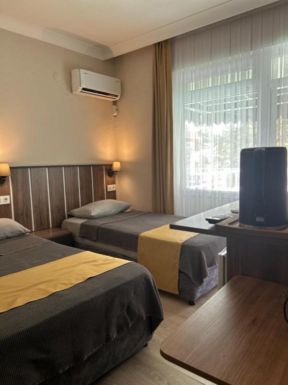 Deluxe Oda, Bahçe Manzaralı (3 Kişilik)