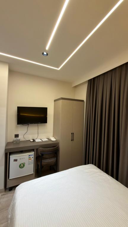 Deluxe Geniş Yataklı Oda Tek Kişilik,Şehir Manzaralı