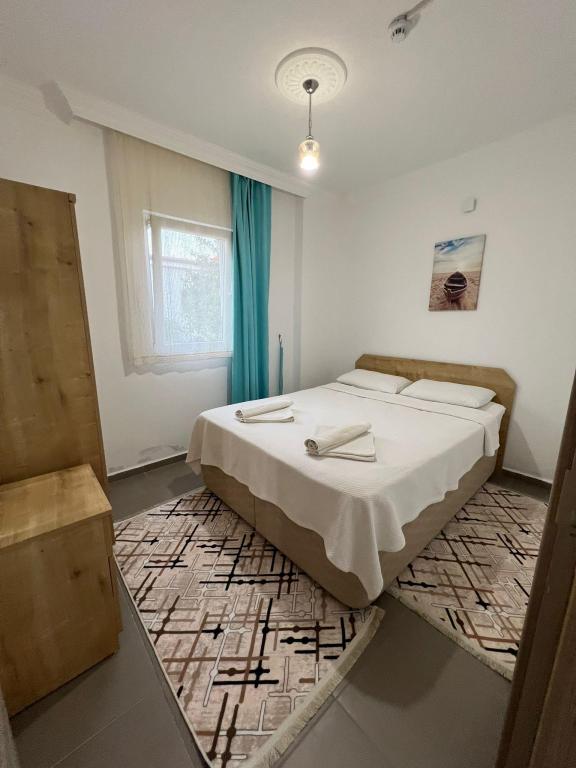Aile Suiti,Deniz veya Bahçe Manzaralı,2. Kat Balkonlu