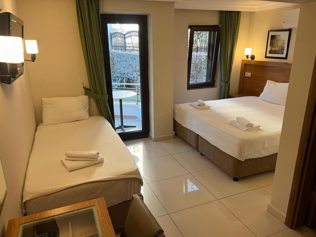 Standard Room, Garden View (3 Person, Balcony)