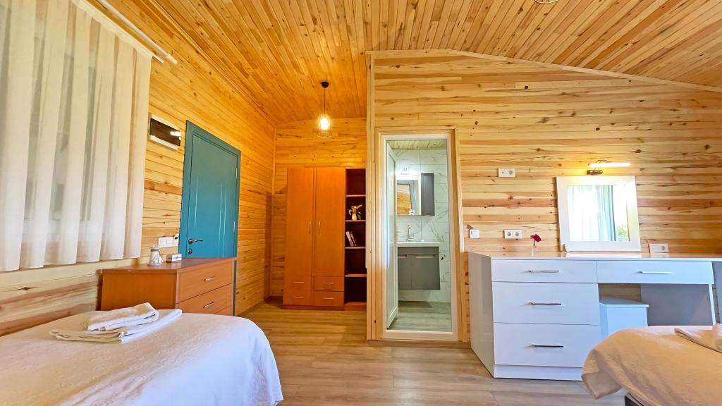 Bungalow 3 Kişilik Oda,Bahçe Manzaralı,1. Kat