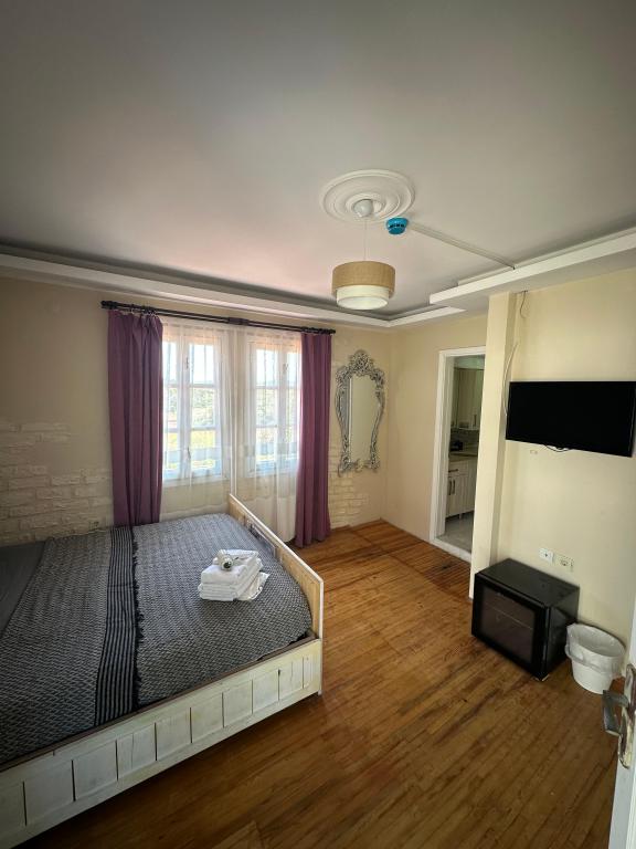 Üst Kat Balkonlu Oda,Bahçe Manzaralı