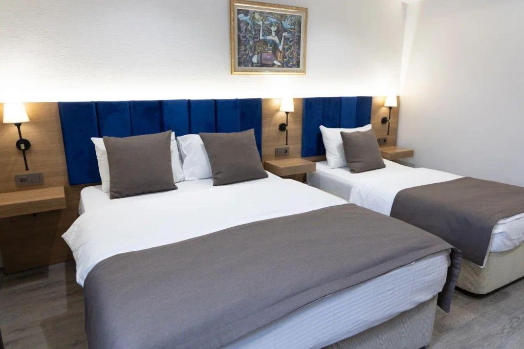 Deluxe Oda Üç Kişilik,Bahçe Manzaralı