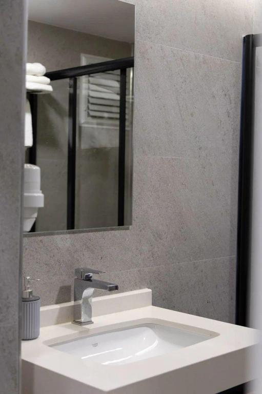 Deluxe Oda Üç Kişilik,Bahçe Manzaralı