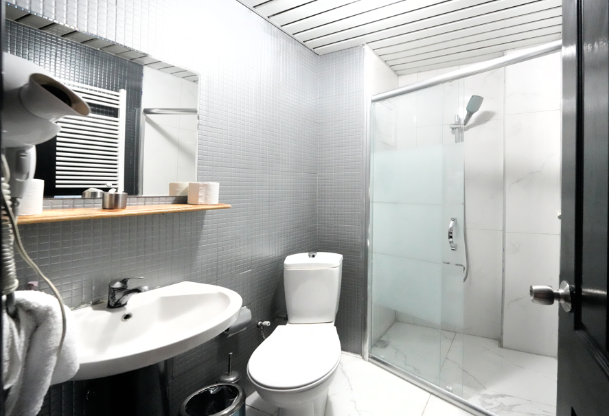 Deluxe Üç Kişilik Oda ,Deniz ve Dağ Manzaralı