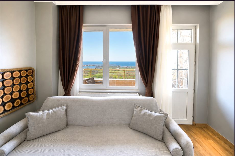 Deluxe Üç Kişilik Oda ,Deniz ve Dağ Manzaralı