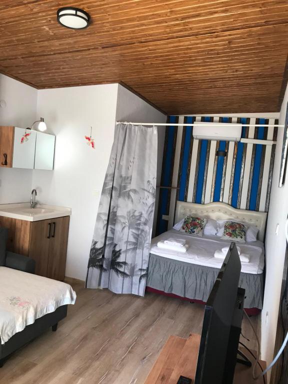 Bungalow,Deniz ve Havuz Manzaralı,Bahçe Katı