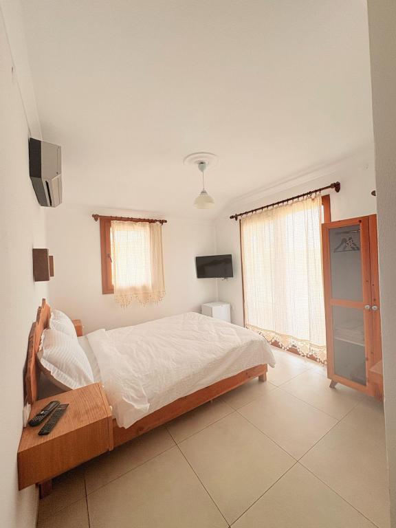 Deluxe Oda,Bahçe Manzaralı,2. Kat Balkonlu