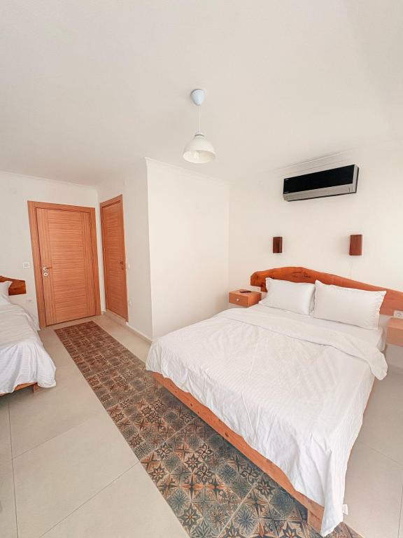 Deluxe Oda,Bahçe Manzaralı,2. Kat Balkonlu