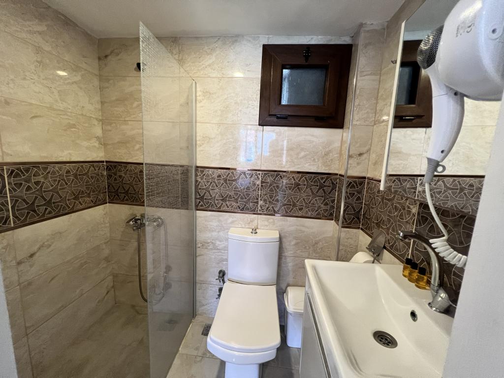 Standart Üç Kişilik Oda,Bahçe Manzaralı,Klimalı