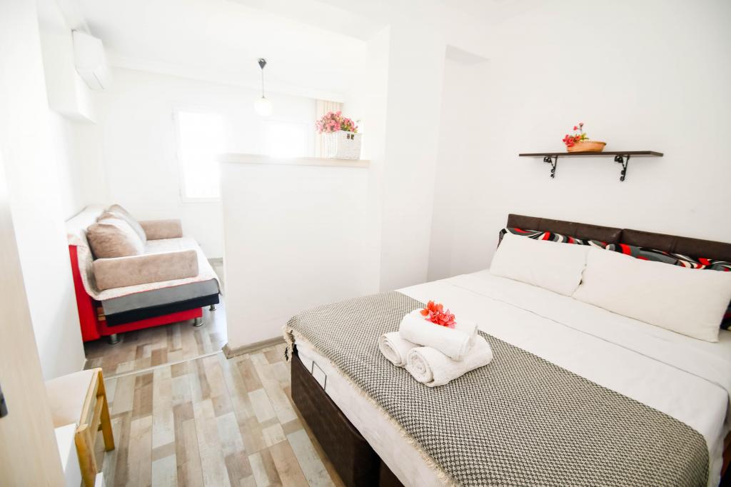 Superior Triple Room,Havuz Manzaralı,Balkon veya Teraslı