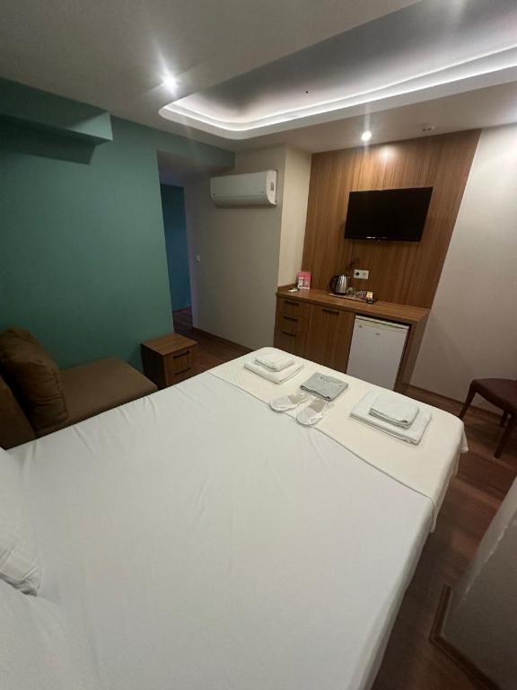 Ekonomik Üç Kişilik Oda,Manzarasız,Penceresiz