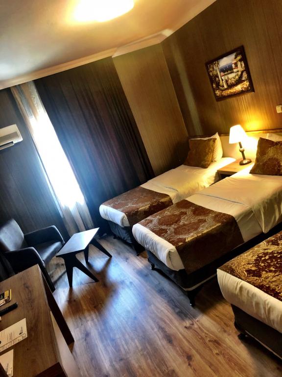 Iki Ayrı Yataklı Oda, Bahçe Manzaralı