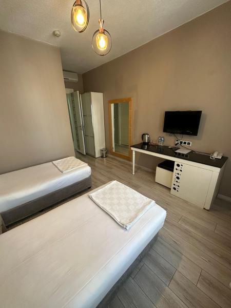 Deluxe İki Tek Yataklı Oda, Şehir Manzaralı, Balkonlu