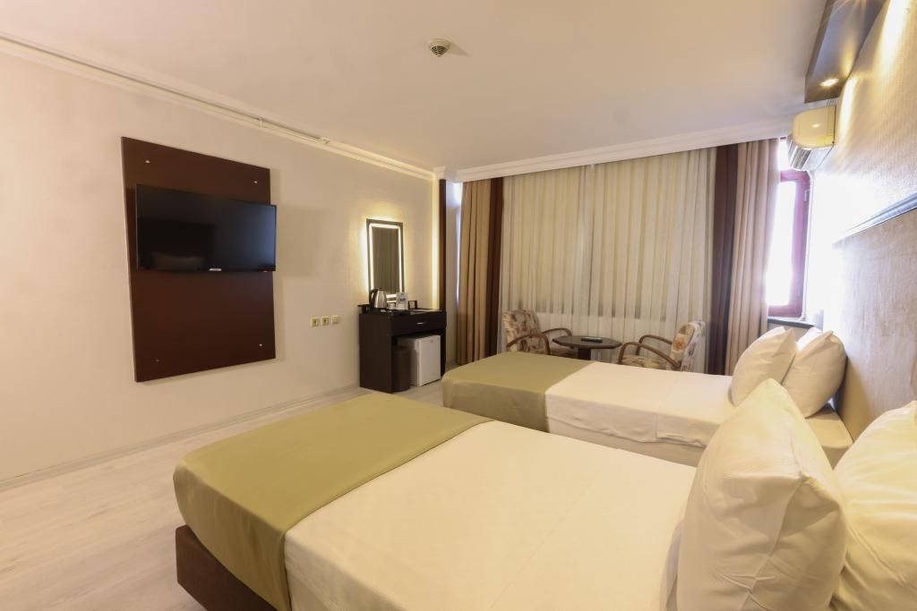 Tilmen Hotel — 8